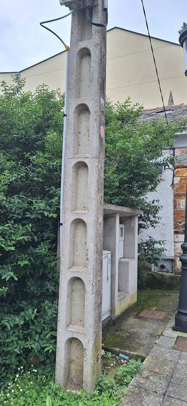 French concrete holey utility pole